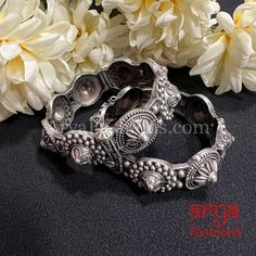 Rajasthani Gokhru Silver Oxidized Openable Bangles- Available Size: 2.6. Can fit size 2.8 due to openable feature.- Silver Oxidized Bracelet bangles in silver finish.- Very Elegant and stylish, these bangles can be paired with any Attire depending upon the occasion and the theme. - The base is pure brass (90%) and pure 92.5 silver (10%) which makes this very sturdy and of good quality. - 100% guarantee on the finish- it will not lose its finish/color/shine. - Very lightweight and Handcarved.- Op Oxidized Bangles, Oxidized Bracelet, Bangles Indian, German Silver, Silver Bangles, Bangle Bracelets, Hand Carved, Bangles, Size 2