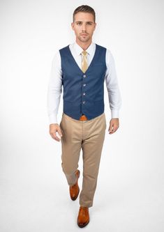 Experience classic styling and modern finesse wearing the Prussian Blue Pinstripe vest. Featuring a vibrant blue hue with subtle pinstripes, this custom made vest will make you feel vibrant and confident. Tailored Pinstripe Sleeveless Vest, Pinstripe Tailored Sleeveless Vest, Tailored Sleeveless Pinstripe Vest, Tailored Pinstripe Vest For Spring, Fitted Blue Vest For Workwear, Blue Fitted Vest For Work, Fitted Striped Business Vest, Striped Fitted Vest For Business, Classic Fitted Sleeveless Denim Vest