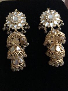 Elegant Kundan Jhumkas With Gota Work, Elegant Jhumkas With Gota Work, Elegant Jhumkas With Gota Work For Diwali, Elegant Dangle Tikka For Festivals, Elegant Festive Jhumkas With Gota Work, Elegant Chandbali Jhumkas With Gota Work, Elegant Bridal Earrings With Gota Work For Festive Occasion, Elegant Chandbalis With Gota Work For Celebrations, Celebration Bridal Earrings With Stone Work