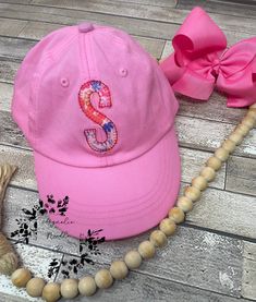 Girls monogrammed hat, Girls appliqué letter hat, floral monogrammed hat, girls hat, girls baseball cap, girls ball cap This is a blush pink ball cap with a beautiful floral one letter monogram! Perfect for those growing toddlers to use for years! Special note from seller Hi, Thank you so much for your business and support of our passion to create custom designs for you! Please know it is our goal to give you the best quality and service we can!  IF YOU NEED THIS SHIPPED OUT FOR SURE WITHIN 2 DAYS PLEASE ADD THE RUSHED ORDER FEE SO THAT IT CAN BE MOVED TO THE FRONT OF MY ORDERS. I SOMETIMES DONT SEE MESSAGES OR COMMENTS ABOUT NEEDING THEM QUICKER SO THIS IS THE ONLY WAY I KNOW TO MAKE SURE IM AWARE!  It is our policy however, due to the personalized nature of our items that we do not do ex Pink Cap With Letter Embroidery, Personalized Pink Cap, Pink Baseball Cap With Letter Embroidery, Pink Hat With Letter Embroidery And Curved Brim, Personalized Pink Baseball Cap, Personalized Pink Snapback Hat, Pink Curved Brim Hat Personalized, Cute Personalized Baseball Cap With Curved Brim, Personalized Cute Baseball Cap With Curved Brim