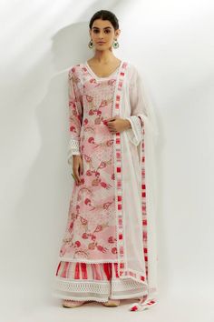 Pastel pink kurta featuring floral print all over with sequin embroidered neckline. Paired with a stripe printed, lace hem palazzo pant and a lace embroidered dupatta. - Aza Fashions Pink Floral Print Palazzo Set With Straight Kurta, Bohemian Pink Sharara With Sheer Dupatta, Elegant Pink Floral Print Salwar Kameez, Traditional Pink Floral Print Sets, Spring Pink Floral Print Sharara, Unstitched Pink Sets With Printed Motifs, Pink Floral Print Straight Kurta Traditional Wear, Pink Bohemian Sharara With Cutdana, Bohemian Pink Salwar Kameez For Wedding