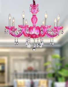 a pink chandelier hanging from the ceiling