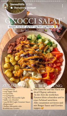 a bowl filled with meat and vegetables on top of a table