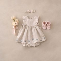 Indulge your little one in the epitome of elegance with our exquisite Beige Linen Baby Dress. Crafted with meticulous attention to detail and imbued with classic charm, this dress embodies sophistication and grace, making it a cherished addition to any baby girl's wardrobe. 55% Linen 45% Cotton Embroidered details Coconut buttons on back Machine wash delicate/gentle, Do not bleach, Tumble dry normal, Iron medium Linen Baby Dress, Embroidered Baby Clothes, Baby Birth Announcement Cards, Baby Fits, Linen Romper, Elegant Baby, Floral Embroidered Dress, Flaxseed, Embroidered Details