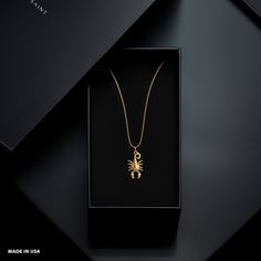 Discover our gold Scorpio pendant, a celestial masterpiece crafted in solid gold. PENDANT INFORMATION This pendant is made of real, solid gold.• Made in USA• Size: MINI• Material: 14k or 18k solid gold• Finish: polished• Height: 1.13" (28,5 mm) x Width: 0.63" (16 mm)• Pendant weight (approx.): 3 grams (14k)• Bail: fits up to 4 mm chains• A certificate of authenticity is included• Delivered in our elegant jewelry box, making it the perfect giftPlease note: Our Mini sized pendants are small and de Yellow Gold Symbolic Jewelry With Box Chain, Symbolic Yellow Gold Jewelry With Box Chain, Symbolic Yellow Gold Box Chain Necklace, 14k Gold Celestial Jewelry For Formal Occasions, Celestial 14k Gold Jewelry For Formal Occasions, Celestial Yellow Gold Jewelry Gift, Celestial Style Yellow Gold Jewelry Gift, Luxury Brass Jewelry With Box Chain, Formal Celestial 14k Gold Jewelry