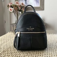 Kate Spade Karina Mini Convertible Backpack Bag Black Leather $329. Price Is Strictly Firm Details 8.7"H X 6.7"W X 3.6"D Pebbled Leather Lining: 2 Way Spade Jacquard Metal Pinmount Logo Zip Around Closure Interior Back Slip Pocket Exterior Front Zip Pocket Imported Style # Wkru7056 Kate Spade Leather Backpack With Detachable Strap For On-the-go, Kate Spade Leather Backpack With Detachable Strap, Kate Spade Travel Bags With Zipper Closure, Kate Spade Versatile Bag With Zipper, Chic Kate Spade Leather Backpack With Detachable Strap, Versatile Kate Spade Bag With Zipper, Chic Kate Spade Leather Backpack For Everyday Use, Kate Spade On-the-go Backpack With Detachable Strap, Kate Spade Backpack With Detachable Strap For On-the-go