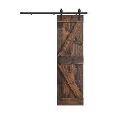 the sliding barn door is made out of wood and has metal bars on each side