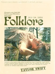 the poster for folkloree shows a woman laying on her stomach in water and grass