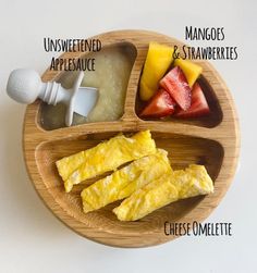 a wooden plate topped with different types of food