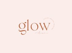 the word glow written in brown on a pink background