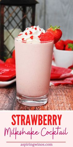 strawberry milkshake cocktail with whipped cream and strawberries