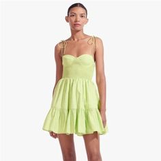 Staud Mini Landry Dress In Lime Spring A-line Ruched Sundress, Chic A-line Mini Dress By Staud, Staud Summer A-line Dress, Staud A-line Dresses For Spring, Ruched A-line Spring Sundress, Ruched A-line Sundress For Spring, Spring A-line Mini Dress With Ruched Details, Green Ruched Mini Dress For Garden Party, Spring Ruched A-line Sundress