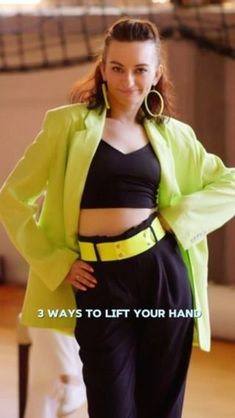 a woman standing in front of a white wall with the words 3 ways to lift your hand