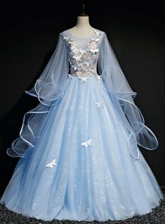 A beautiful dress is a blessing; we should try to get this blessing because it helps us to tell others about our common attitude towards life. Sky blue dress with fine artwork is the output that we received after the hard work of a long time. There are multiple features of the dress; for example, it is rightly prepared with the ball gown style, which unique due to the likeness of the ladies; we all know what the importance of the ball gown design is, particularly near the ladies. Series of designs are available in the present dress, for example, simple scoop design of neckline, sleeveless designs of sleeves. The beauty of the dress is not something that is ordinary and cannot be discussed. Sweet 16 Dresses Blue, Blue Sweet 16, Prom Dress Blue, Blue Ball Gowns, Blue Party Dress, Long Prom Gowns, Blue Dress Formal, Blue Tulle, Tulle Ball Gown