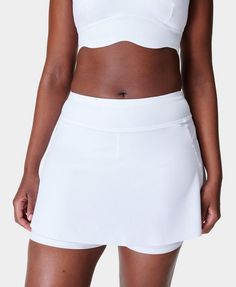 A multi-functional performance skort. Sweat-wicking fabric with lightweight and breathable over skirt. Supportive inner shorts. Inseam length: 5" / 12cm. Skirt length: 26.4cm from underband to hem. Model wears size S and is 178cm/5'10" tall. Style Code: SB2478Colour: White Skirted Skort With Built-in Shorts For Workout, Tennis Mini Skirt With Built-in Shorts, White Tennis Dress With Built-in Shorts For Sports, Solid Tennis Skort With Built-in Shorts, 4-way Stretch Tennis Skort With Built-in Shorts, Workout Nylon Tennis Skirt With Built-in Shorts, Functional Tennis Skort With Built-in Shorts, Summer Sports Lined Swim Skirt, Lined Swim Skirt For Summer Sports