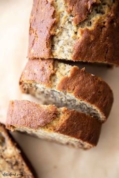 sliced banana bread sitting on top of a cutting board