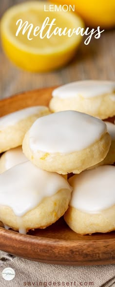 lemon mellows on a wooden plate with white icing