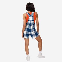 Show your team spirit in these stylish and comfortable Auburn Tigers Women's Plaid Bib Shortalls. With their all-over team-colored design and bold team logo display, these shortalls are the perfect way to show your support for the Auburn Tigers while showing off some buffalo plaid fashion for a rustic, rural feel. The bib pocket is perfect for storing your phone, makeup, jewelry, skincare products, fragrances, or other essentials, and the adjustable bib shoulder straps ensure a comfortable fit. Collegiate Style Cotton Bottoms For Summer, Summer Collegiate Style Cotton Bottoms, Casual White Cotton Shortalls, Casual Cotton Overall Shorts, Casual White Relaxed Fit Overalls, Lumberjack Style, Logo Display, Auburn Tigers, One Piece Pajamas