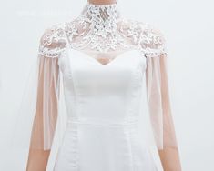 Handmade romantic lace bridal cape by yours truly. This bridal cape can be worn as many styles as you wish Color : Light Ivory Details: High collar Cape length 50cm/ 20in Back closing with button Materials :tulle, Rhinestone, crystal, pearl Standard size: Neck: 32-35cm Shoulder:36-40cm Bigger size (10 Neck: 36-41cm Shoulder: 41-45cm Shop other BRIDAL CAPES here : http://etsy.me/2zd6PZj Turnaround time: Due to the delicate nature of the handcrafted goods we produce this cover up has creation time Dress Coverup Ideas, Wedding Dress Capelet, Wedding Bodysuit, Bridal Bodysuit, Bridal Capelet, Lace Cape, Cape Wedding Dress, Bolero Wedding, Bridal Bolero