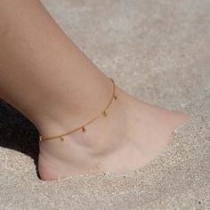 "This anklet is an effortless way to show off your inner goddess.  It's more than just a fashion statement - it's an affirmation of self-love and being unapologetically you. An empowering reminder of how amazing you are, wrapped around your ankle. It has a stunning vibe all on it's own but if you're looking for a modern twist, why not try stacking two or more anklets together.   Material: 18k gold vermeil Chain type : Cable chain Chain length (adjustable): 8.5\" + 1.5\" extension  --- CRAFTMANSHIP --- It is meticulously crafted using exceptional quality 18k gold vermeil. Gold vermeil is not to be confused with gold plating. It is significantly more durable. But not all gold vermeil is equal.  At Jolie Co we apply a thick 3-micron layer of 18k gold onto 925 sterling silver. In addition, a h Anklets Indian, Anklet Designs, Heart Anklet, Navel Jewelry, Traditional Indian Dress, Belly Jewelry, Ankle Chain, Gold Anklet, Inner Goddess