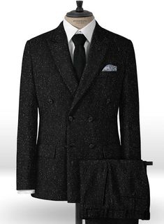 Maximize the versatility of your tweed collection by adding up this Black Flecks Donegal Tweed suit. Crafted from woolen fabrication, the suit with its traditional color flecking makes for a comfortable, high toned and professional looking way to tackle the cold weather. The Donegal tweed has helped keep the tradition of tweed alive, also injecting new life and energy into this iconic cloth. Pair it with a white shirt and black shoes to seal the ensemble. 
 
 Look Includes  Black Flecks Donegal Grey Tweed Suit, Herringbone Tweed Jacket, White Linen Suit, Green Velvet Jacket, Peaky Blinders Suit, Royal Blue Suit, Donegal Tweed, Tweed Suit, Great Coat