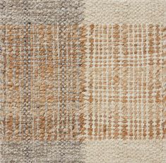 an area rug with different colors and patterns on the carpet, including brown, beige, gray