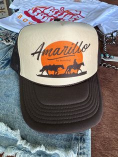 The "Amarillo By Morning" Trucker Hat is a charming nod to classic country vibes! Featuring a stylish design that celebrates the spirit of the open road, this hat is perfect for those who love adventure and a little bit of twang. With its comfortable fit and eye-catching graphics, it's an essential accessory for any cowboy or cowgirl ready to ride into the sunset! One Size Fits Most Beach Cowboy Hat, Beach Cowboy, Amarillo By Morning, Country Vibes, Casual Bodysuit, Sweater Tank Top, Plus Size Shopping, Open Road, Boys Jacket