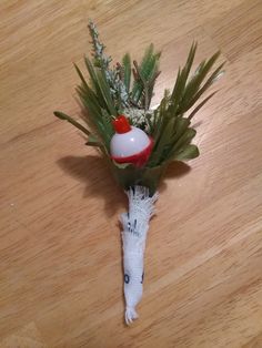 a bouquet of flowers sitting on top of a wooden table