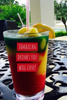 a colorful drink sitting on top of a table