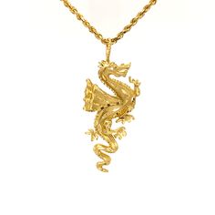 Channel your inner DRAGON QUEEN by wearing this gangsta one-of-a-kind vintage gold necklace. I wish I could ride a dragon, but wearing this beast is a close second. Both the diamond cut dragon pendant and the rope chain are 14K gold. The 22" chain has a lobster clasp and the total approximate weight including the pendant is 10.40 dwt. Do Good: We donate 2% of monthly SALES to Girls Not Brides org members. Vintage jewelry may contain minor markings and/or imperfections throughout. Due to the fact Symbolic Gold Dragon Jewelry, Symbolic Gold Jewelry With Dragon Design, Traditional Gold Jewelry With Dragon Design, Gold Necklace With Dragon Design Collectible, Traditional Dragon Design Collectible Jewelry, Yellow Gold Necklace With Dragon Design As Gift, Unique Dragon Design Necklace For Collectors, Unique Dragon Design Necklace Collectible, Vintage Gold Necklace