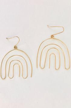 These Rainbow Earrings are handmade using 14k gold filled or sterling silver wire. These dangling earrings complete the look of any outfit. Shop these Rainbow Earrings at https://thirtynineonetwenty.com/product/rainbow-earrings-2/ #handmadeearrings #wirewrappedearrings #bohojewels #bohojewelry #jewelry #womensjewelry #goldfilledearrings #danglingearrings #womensearrings #rainbowearrings #statementearrings #bohoearrings #partyearrings #boho Handmade Minimalist 14k Gold Filled Threader Earrings, Everyday 14k Gold Filled Nickel Free Threader Earrings, Minimalist Handmade 14k Gold Filled Threader Earrings, Hypoallergenic Brass Dangle Earrings, Gold Silver-plated Wire Earrings For Gift, Wire Wrapped Brass Chandelier Earrings, Wire Wrapped 14k Gold Filled Hoop Earrings, Gold Silver-plated Wire Earrings As Gift, Wire Wrapped 14k Gold Filled Yellow Gold Earrings