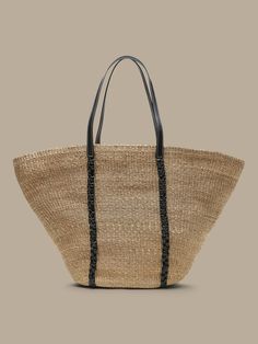 Approach every adventure, whether remote or routine, with the laid-back sophistication of this natural straw tote with sturdy leather handles and BR's signature monogram.  Sturdy leather handles.  Open top (no closure).  Fully lined in soft cotton. Casual Beach Bag With Leather Handles And Natural Fiber, Casual Beach Bag With Leather Handles In Natural Fiber, Casual Natural Straw Bag With Leather Handles, Casual Jute Straw Bag With Leather Handles, Vacation Woven Leather Beach Bag, Beach Tote Bag With Leather Trim, Natural Straw Tote Bag With Leather Trim, Natural Straw Travel Bag With Handles, Beige Straw Bag With Leather Trim