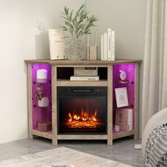 a living room with a fire place in the center and books on the shelf next to it