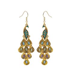 PRICES MAY VARY. 【Excellent quality】- Boho peacock bird chandelier earrings are made of highly polished alloy through metal plating process, so they have a fine lustre. They are hypoallergenic and comfortable to wear. The rounded curved edges also bring a delicate touch to the bohemian peacock phoenix tassel earrings. 【Size】- 83 × 28mm, a pair of studs with peacock design for each pack is about 10.3g. 【Classic and comfortable to wear】- Cubic zirconia peacock stud earrings can fit well with your Peacock Design Dangle Chandelier Earrings, Bohemian Metal Earrings With Peacock Design, Bohemian Danglers With Peacock Design, Bohemian Peacock Design Earrings For Party, Peacock Design Dangle Chandelier Earrings Gift, Bohemian Gold Earrings With Peacock Design, Bird Chandelier, Statement Earrings Silver, Peacock Jewelry