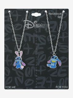 two necklaces with cartoon characters attached to them on a black cardboard background that says necklace set for me