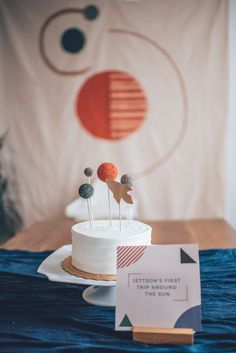 a white cake sitting on top of a table