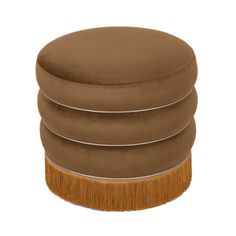 three round stools stacked on top of each other with fringed wooden legs and brown cushions