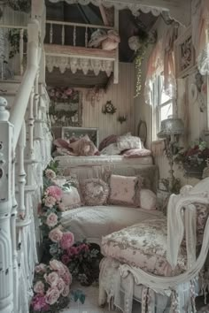 an old fashioned bedroom with white furniture and pink flowers