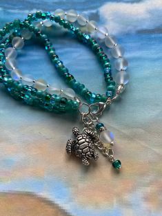 Mermaid Glass Bracelet, 3 Strand, Mermaid Teal and Irridescent, Day-glow, Angel Aura, Mystic Aura Quartz Bead Bracelet With Choice of Charm. - Etsy Mermaid Glass, Day Glow, Angel Aura, Synthetic Opal, Mermaid Costume, Beautiful Mermaids, Band Bracelet, Czech Crystal, Strand Bracelet