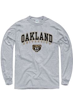 Show off your team pride in this Oakland University Golden Grizzlies Grey Arch Mascot Long Sleeve T Shirt! This Griz Long Sleeve Tee features a screen printed Oakland wordmark and logo. Make sure everyone knows you root for the Golden Grizzlies with this Grey Griz T Shirt. Go Golden Grizzlies! Classic fit, Seamless double needle 7/8" collar, Taped neck & shoulders, Ribbed cuffs, Unisex, Fit: True to Size, 100% Cotton Collegiate Long Sleeve T-shirt With Screen Print, Collegiate Long Sleeve T-shirt For College, Collegiate Long Sleeve College T-shirt, Game Day Graphic Tee With Long Sleeves, Collegiate Long Sleeve T-shirt With Graphic Print, Collegiate Long Sleeve Graphic Print T-shirt, Long Sleeve T-shirt With Team Logo For Fan Gear, Long Sleeve T-shirt With Team Logo For Streetwear, Long Sleeve Graphic Print T-shirt For Sports Fans