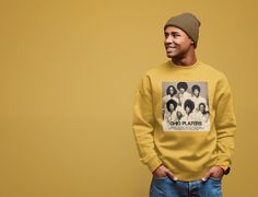 This a Gildan 18000 Unisex Heavy Blend Crewneck Sweatshirt. Featuring a graphic print of iconic 1970s Funk, Soul, Rock, and Pop music legends, Ohio Players. This loose-fit, aesthetic sweatshirt would be an ideal gift for R&B, Soul, Funk, Disco, Motown, 70s and 80s Rock and Pop and Jazz music fans, music lovers and band teachers, and a great addition to music lovers band t-shirt collections. Share the BLM and equal rights message in a positive way. This soft sweatshirt has a loose fit for a c Retro Graphic Print Sweatshirt For Fans, Retro Graphic Print Sweatshirt For Concerts, Vintage Graphic Print Sweatshirt For Fan Merchandise, Retro Crew Neck Sweatshirt For Concerts, Vintage Fan Merchandise Graphic Sweatshirt, Retro Band Logo Tops, Ohio Players, Fit Aesthetic, Band Teacher