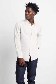 DETAILS | Lightweight cotton, long sleeve, neutral hummus beige buttondown shirt featuring relaxed fit and patch pocket at chest. Super soft, breathable cotton fabric mixed with a relaxed body shape makes the Wyatt the perfect Southern California inspired buttondown. 100% Cotton. Imported. CARE | Machine Wash Cold. Tumble Dry Low. Remove Promptly. Do Not Bleach. FIT | Recommend ordering true to size. Body Length: 30 3/4" (Measured from Large) Coral Blue, Mixing Fabrics, Body Shape, Modern Man, Classic Shirt, Southern California, Fashion Games, Body Shapes, Chest Pocket