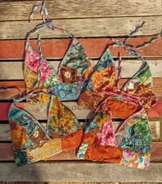 Reversible beachy boho colorful patchwork bralette! Elastic back for comfort and halter ties. Each is one of a kind and unique, all are beautiful. Made with 100% silk patch scraps from making our clothing.  S/M 30 - 36" bust L/XL 38 - 42" bust 2/3X 44 - 50" bust MATERIAL CONTENT DISCLAIMER:  While in the process of switching our silk line to a more sustainable plant based vegan viscose you may receive this item in one of the two following compositions below. We will not be able to refund or acce Bohemian Style Plus Size, Plus Size Festival, Recycled Patchwork, Hippie Fits, Hippie Top, Beachy Boho, Hippie Girl, Top Halter, Halter Tops