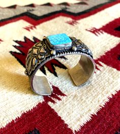 This is an original Darryl Becenti sterling silver cuff bracelet, adorned with a beautiful turquoise square. Like all of Darryl's pieces, the high amount of pure silver gives it a substantial and rich feel. Western Ideas, Navajo Art, Native American Paintings, Signature Stamp, Sterling Silver Cuff Bracelet, Petrified Wood, Sterling Silver Cuff, Man Style, Silver Cuff Bracelet