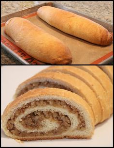 there are several different types of breads on the counter and one is cut in half