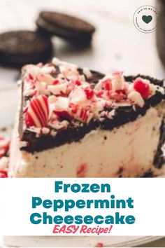 a piece of frozen peppermint cheesecake on a plate with cookies in the background