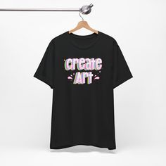 Express your passion for art with our "Create Art" graphic t-shirt. Designed to inspire artists and art teachers, this tee showcases a vibrant and eye-catching design that beautifully captures the essence of creativity. Made from premium quality materials, it offers both comfort and durability, perfect for everyday wear or as a statement piece in the art studio or classroom. Whether you're an artist seeking motivation or an art teacher looking to inspire your students, this tee is a must-have addition to your wardrobe. Makes a thoughtful gift for art lovers, creative souls, and the dedicated art educators in your life. Embrace your artistic spirit and let this tee be a symbol of your love for art and self-expression. .: 100% Airlume combed and ringspun cotton (fiber content may vary for di Artistic Graffiti Print T-shirt Relaxed Fit, Artistic Graffiti Print T-shirt In Relaxed Fit, Artistic Relaxed Fit T-shirt With Graffiti Print, Graphic Tee T-shirt For Artistic Expression With Custom Artwork, Artsy Custom Print T-shirt For Streetwear, Artistic T-shirt With Custom Artwork, Relaxed Fit, Artistic Graphic T-shirt, Artistic Cotton T-shirt With Graffiti Print, Artistic Relaxed Fit T-shirt With Custom Artwork