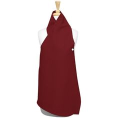 a red apron hanging on a wooden hanger