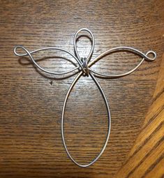 a metal object sitting on top of a wooden table