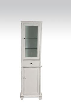 a tall white cabinet with glass doors and drawers on the bottom, in front of a white background